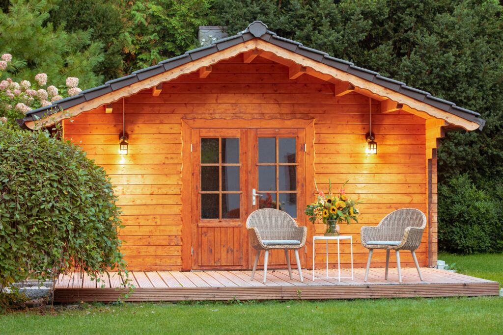 Picture of a summer house with lighting and outdoor seating