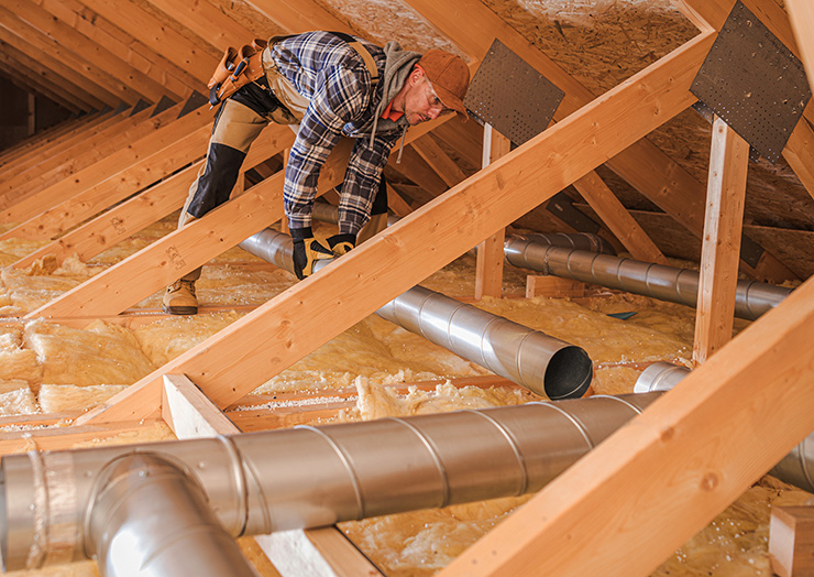 Picture of a tradesperson in a loft 