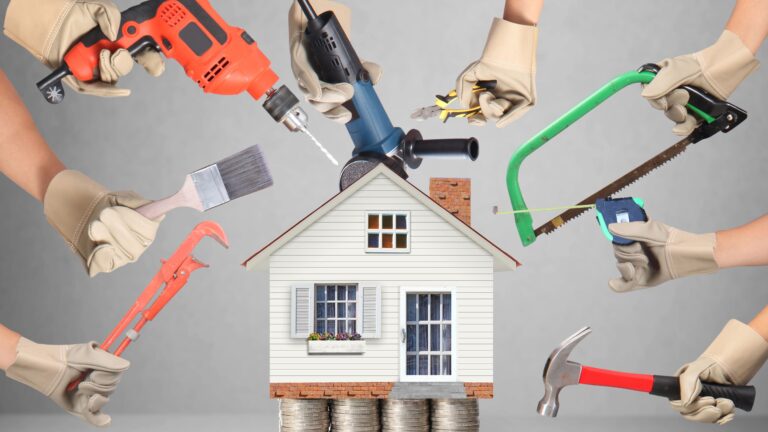 home repair illustration of a white home sitting on stacks of change as people hold various tooks in an arc above it. the background is gray.